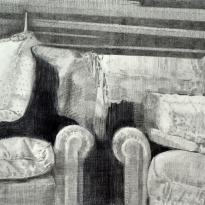 Rincón de un tapicero y sofás